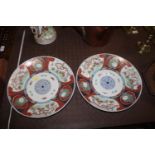 A pair of Imari pattern plates