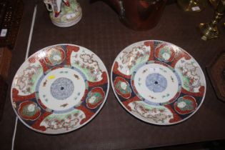 A pair of Imari pattern plates