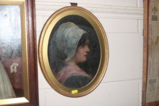 An oval gilt framed oil, portrait study of lady wi