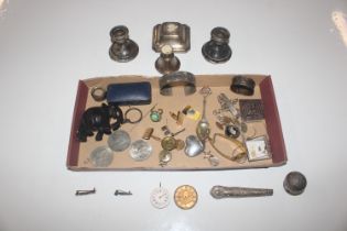 A box of various silver items including candlestic