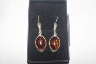 A pair of large Sterling silver and amber drop ear