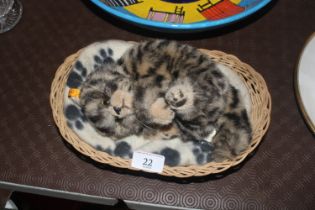 A Steiff kitten in basket