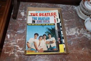 A box of four Beatles magazines