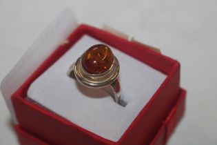 A Sterling silver and amber ring, size L/M