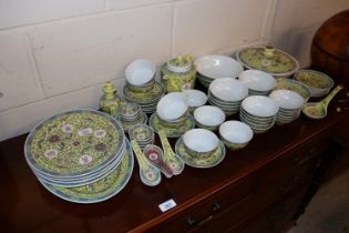 A quantity of famille rose pattern dinnerware