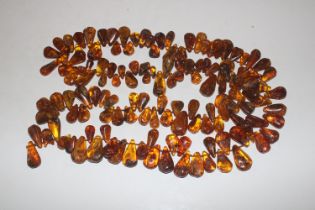 Approx. 120cm long string of pear shaped amber nec