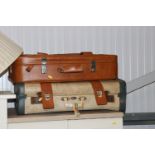 A Monarch suitcase together with another