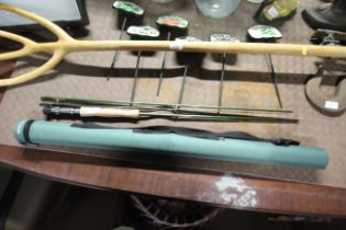 A Greys fly fishing rod with Greys hard carry case