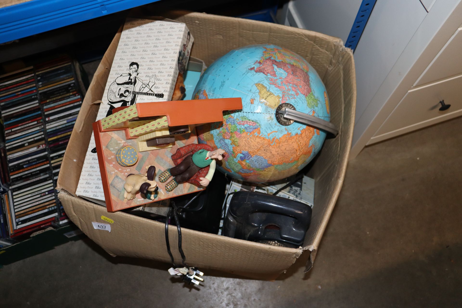 A box containing various sundry items to include a