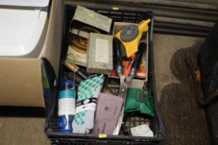 A plastic tray containing various garden related i