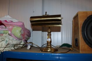 A brass desk lamp