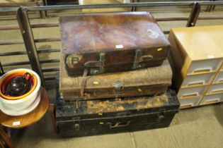 A leather travel case initialled to E.E.Y.M and two