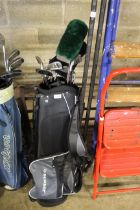 A Dunlop golf bag and contents of left handed golf