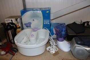 A Morphy Richards deep massaging foot spa and a fa