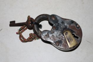 A vintage padlock and key