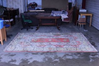 An approx. 9'10" x 6'7" patterned rug AF