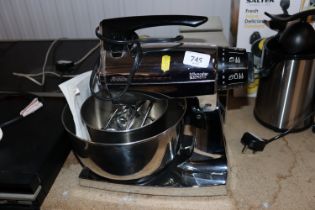 A Sunbeam Mix Master electric mixer and accessorie