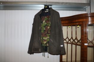 A Quicksilver beating wax coat, size M, with a pai