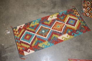 An approx. 4'9" x 2' Chobi Kelim runner