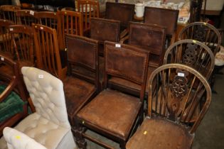 A set of six oak framed chairs comprising four sta