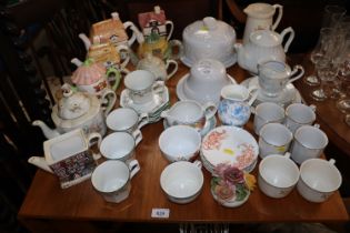 A collection of various china to include novelty t