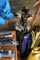 A golf bag and contents of clubs to include Wilson