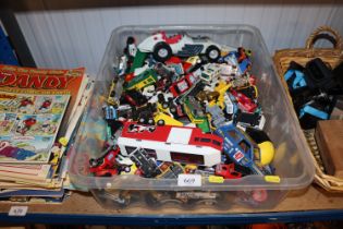 A box containing various die cast vehicles to incl