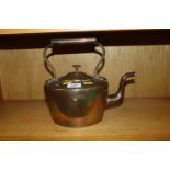 An antique copper kettle