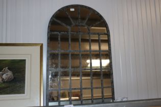 A small leaded glass mirror (80)