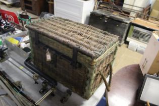 A wicker trunk ex MOD, approx. 26" x 15" x 18" wit