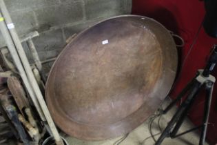 A large galvanised skillet