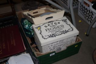 A box containing kitchenalia; wooden trays etc