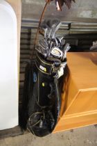 A Wilson Staff golf bag and contents of clubs to i