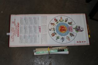 A Chinese fortune calendar and a quantity of chops