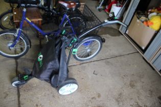 A Hill Billy electrically assisted golfing trolley with a lithium battery