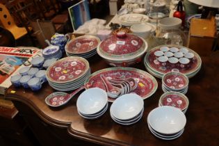 A collection of Chinese dinnerware and a quantity