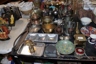 A collection of metalware including brass vases; t