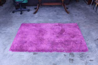 An approx. 5'4" x 4'1" rug