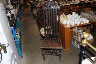 A carved oak barley twist hall chair