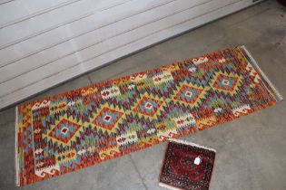 An approx. 6'3" x 1'9" Chobi Kelim runner