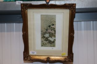 A gilt framed Oriental print with a watercolour si