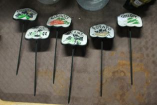 Six painted cast iron vegetable markers (114)