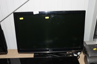 An LG flat screen television lacking remote contro