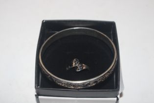 A vintage Sterling silver full bangle and similar