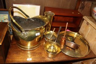 A quantity of metalware to include brass coal helm