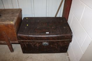 A tin storage trunk