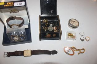 Two boxes containing wrist watches, a souvenir of