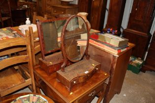 Two 19th Century swing framed mirrors raised on bo