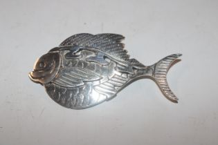A Sterling silver brooch in the form of a stylised