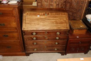 A Georgian bureau fitted four graduated drawers AF